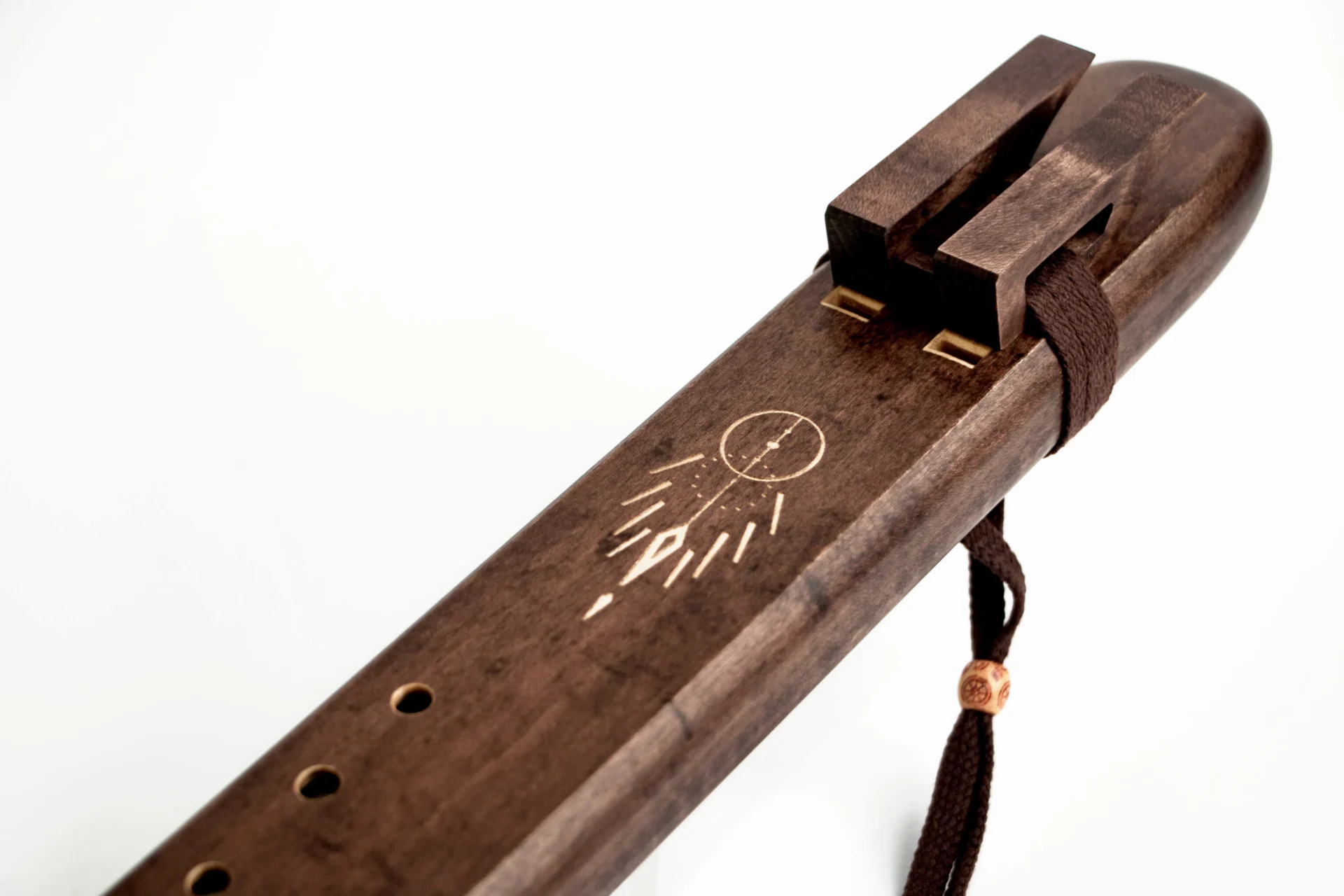 AMA handcrafted F# double flute photographed in soft natural light